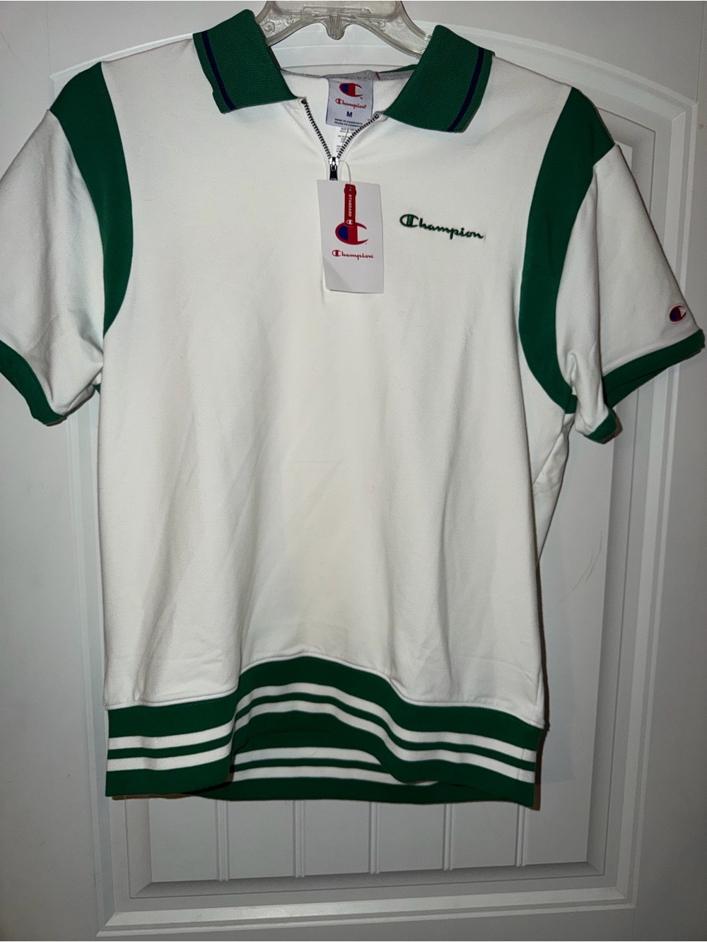 Men’s Champion White Short Sleeve Polo with Green Trim and Striped Hem